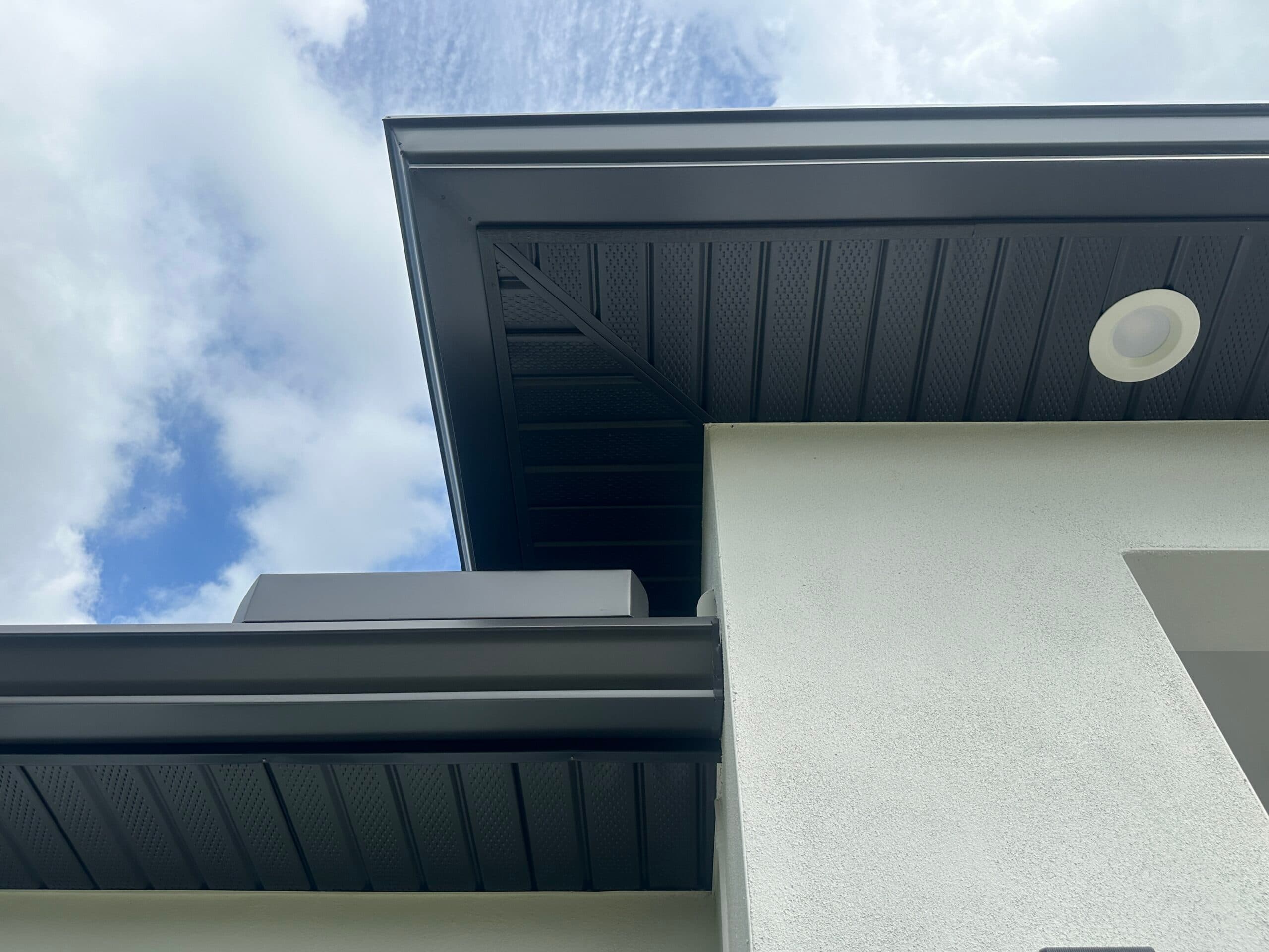 Gutter repair and resealing on two-story home in Venice FL