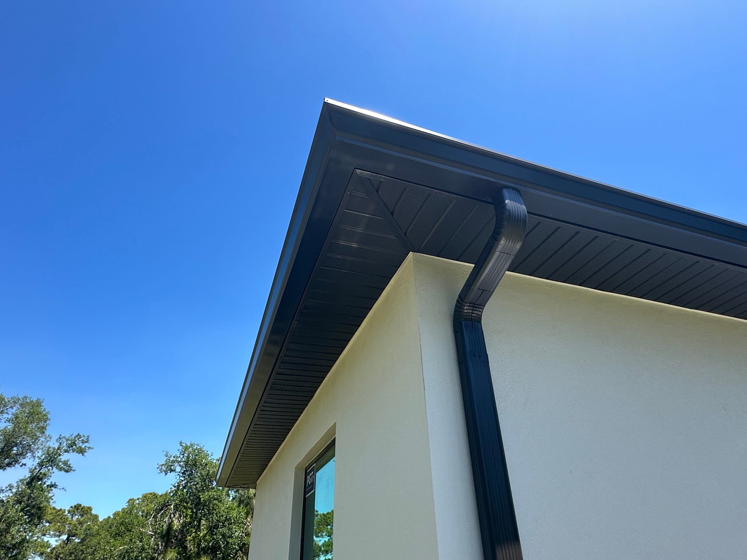 Downspout rerouting and underground drain connection in Port Charlotte FL